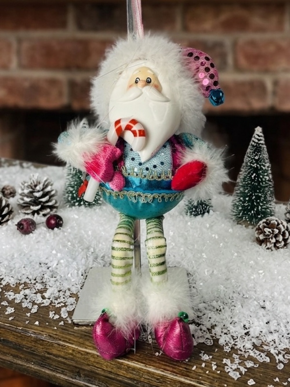 Mark Roberts Whimsical Santa dangling-leg Figurine